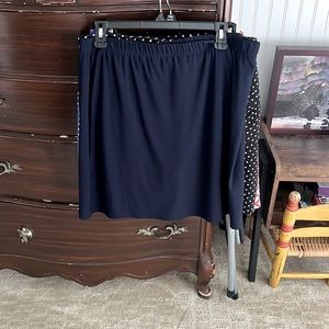 Susan graver liquid knit skort. Like new. Size medium. Navy blue